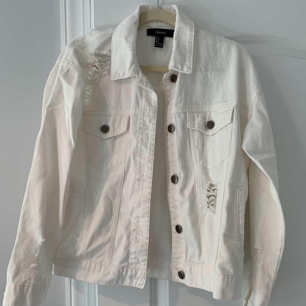 Ripped white jean jacket